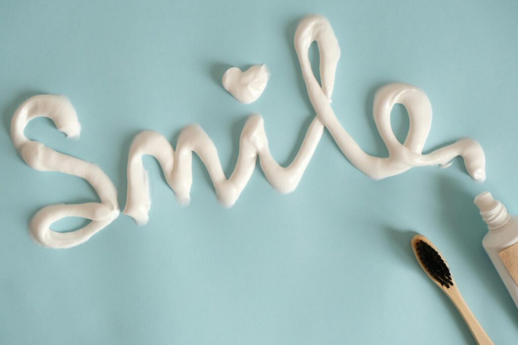 smile written with toothpaste after dental crown Wetherill Park treatment