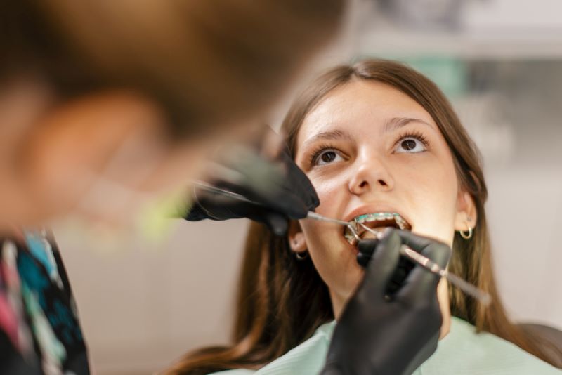Orthodontic adjustment with braces at dental clinic in Wetherill Park