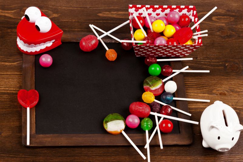 Halloween lollies and sweets on table – dental tips to prevent tooth decay in Wetherill Park