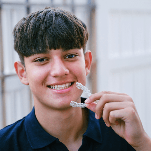 Invisalign clear aligners used for teeth straightening at our Wetherill Park dental clinic