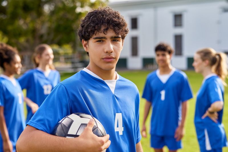 Teen participating in school soccer in Wetherill Park