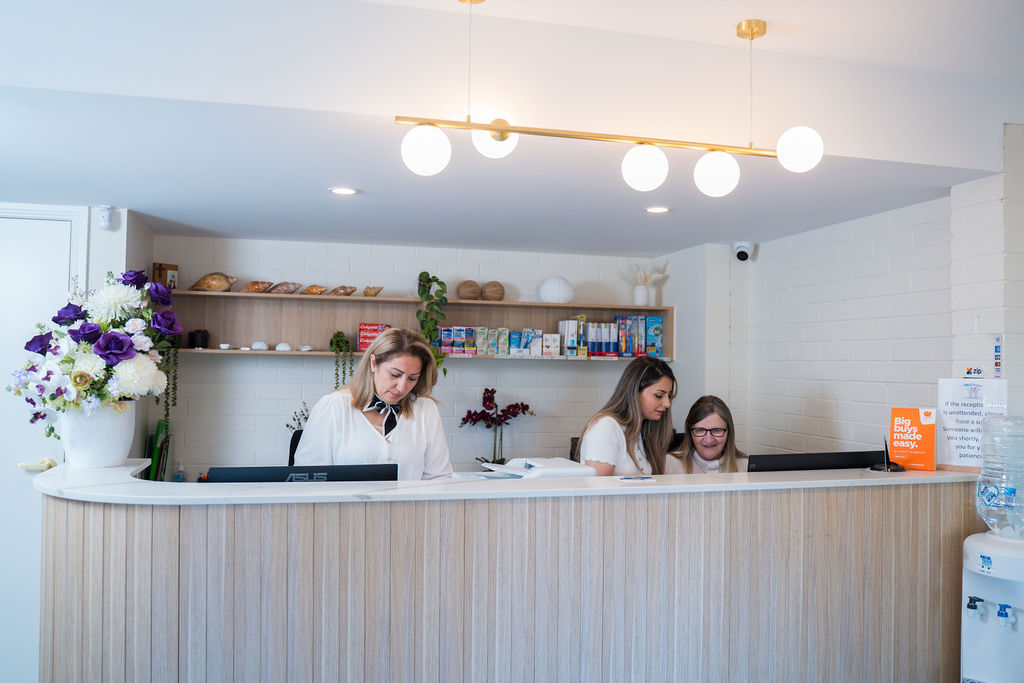 Reception team at Dr Raymond Platon and Associates in Wetherill Park