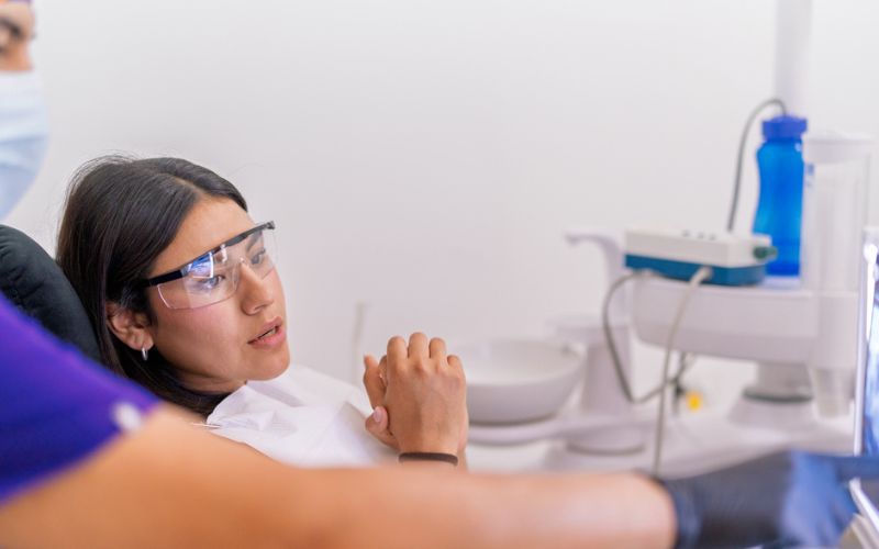 Patient discussing wisdom teeth assessment with a dentist in Wetherill Park