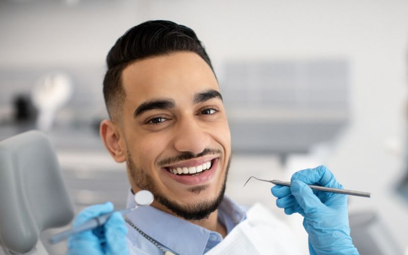 Patient attending a dental consultation to discuss replacement of a missing tooth